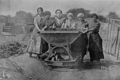 Women Transporting Refuse. War Office photography, 1916 by English Photographer